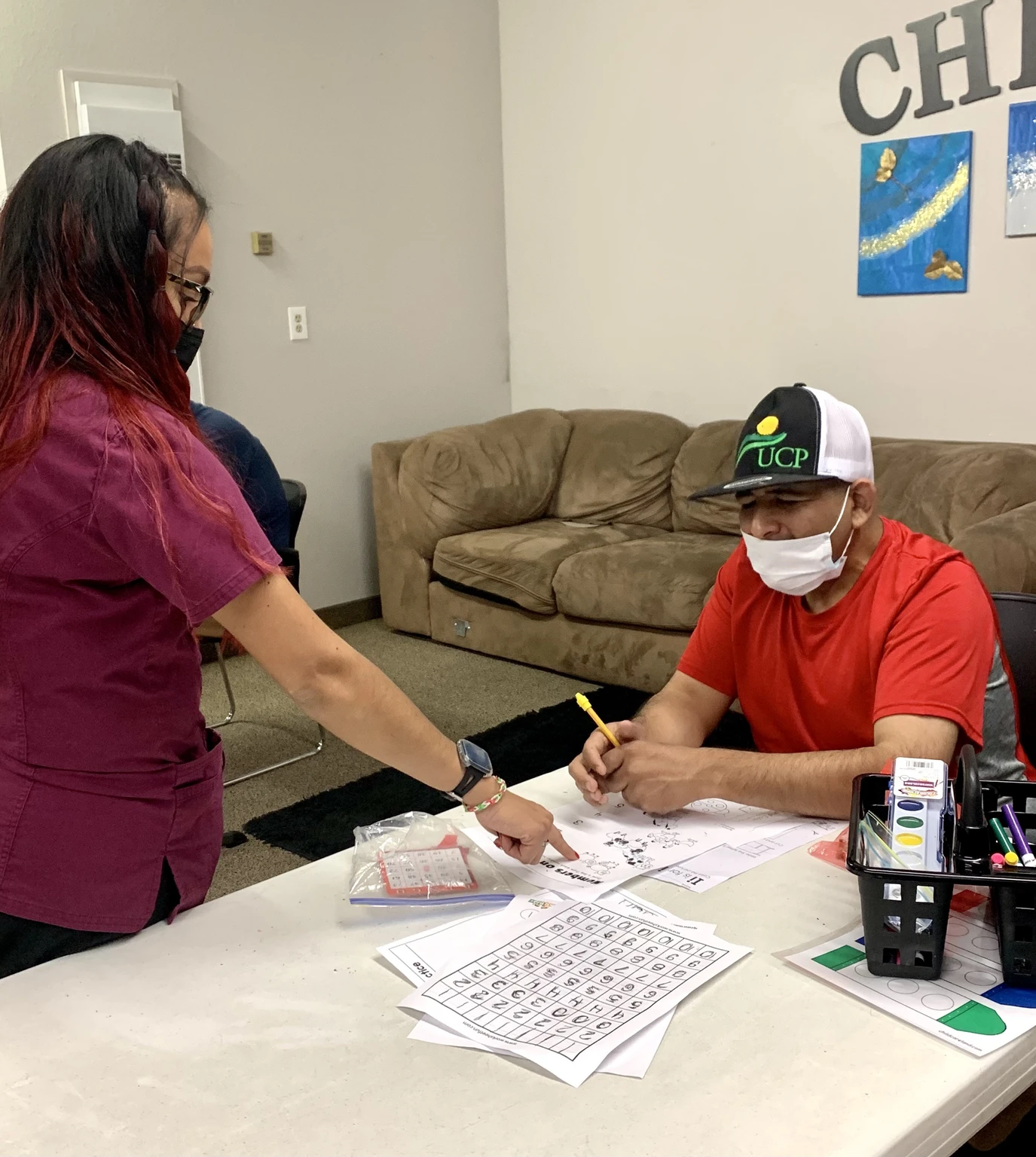 UCPCC teacher and student hard at work in Coalinga.
