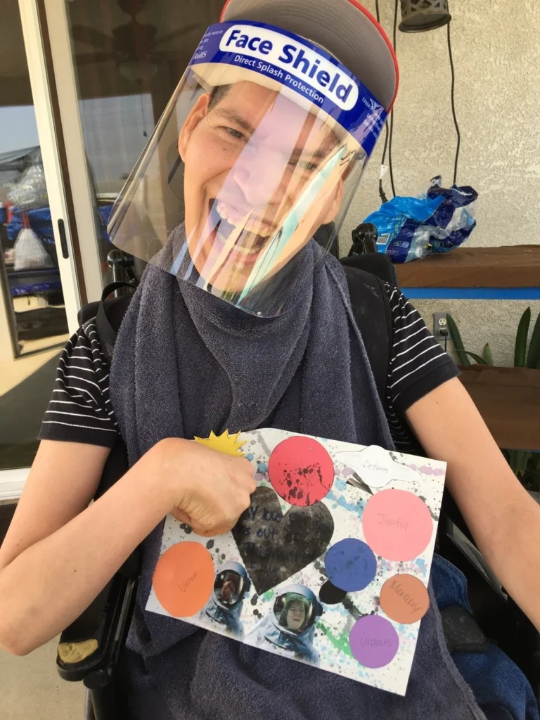 UCPCC student Filiberto shows off his art project.